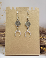 Handcrafted horseshoe earrings with 9mm bullet casing