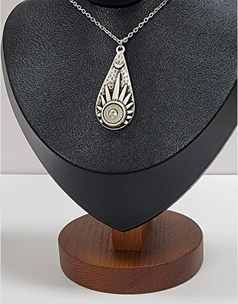 Western sunrise necklace with 9mm bullet inlay on stainless steel chain.